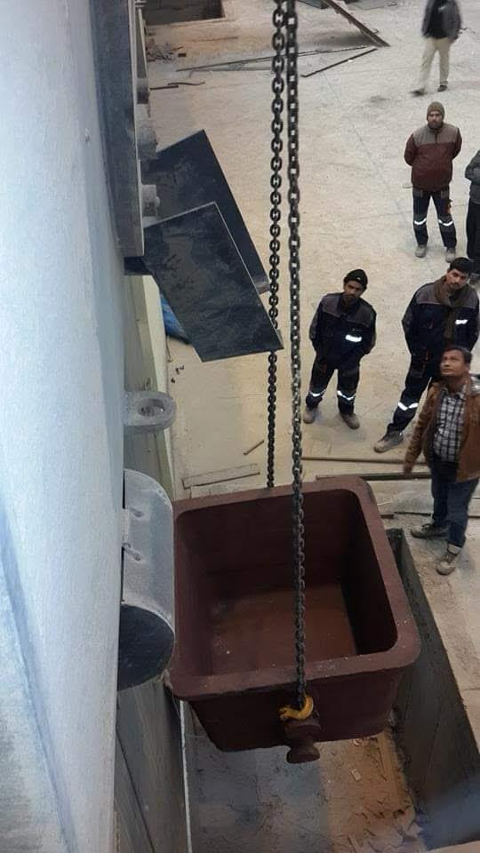 Cost Killer site work — crane lifting equipment at steel plant