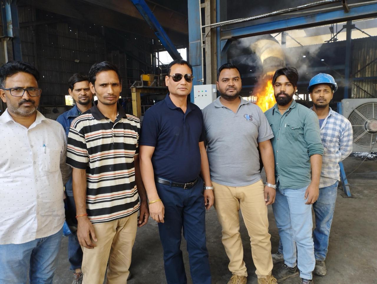 Engineering team at induction furnace